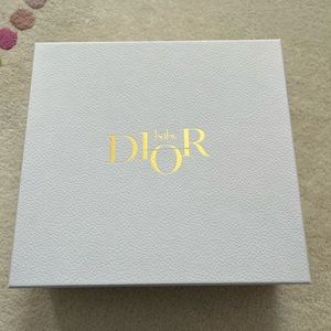 Baby Dior Gift set with three long sleeved onesies.